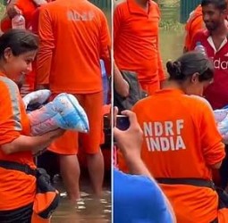 இலங்கை வெள்ளத்தில் சிக்கிய பச்சிளங் குழந்தையை பத்திரமாக மீட்ட இந்திய மீட்பு குழு!